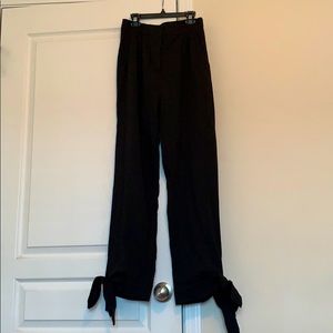 High waisted Black trousers.